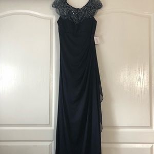 David’s Bridal Navy Blue gown with cap sleeve.